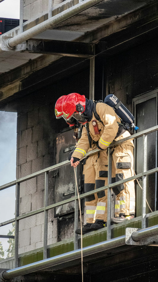 a firefighter on a ladder